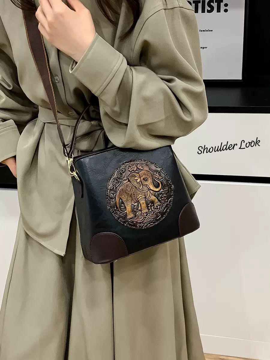 Black Premium Classy Leather Look Elephant Design  Broad Belt Sling Bag for women -GUP001TBL