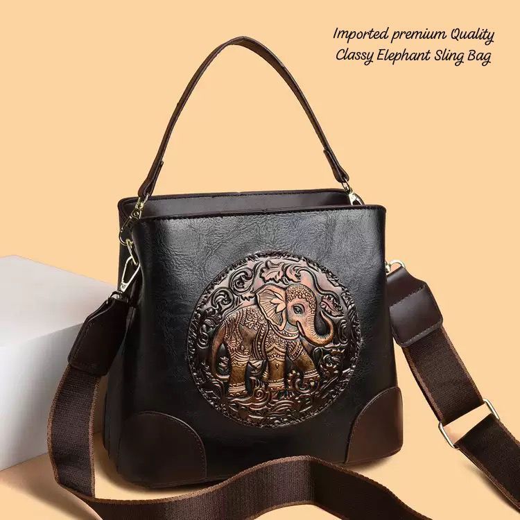 Black Premium Classy Leather Look Elephant Design  Broad Belt Sling Bag for women -GUP001TBL