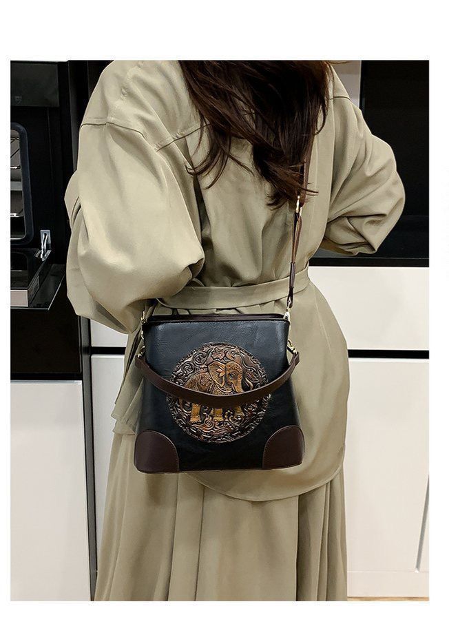Black Premium Classy Leather Look Elephant Design  Broad Belt Sling Bag for women -GUP001TBL