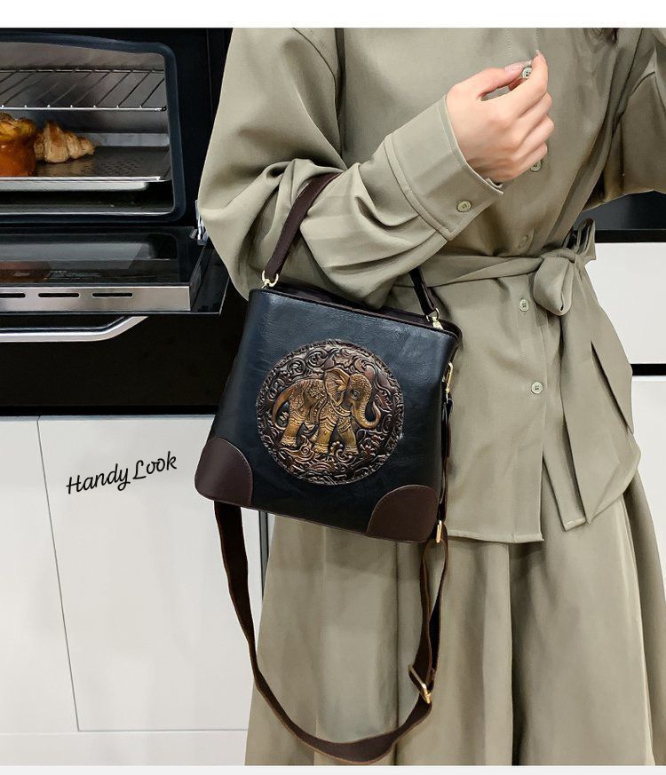 Black Premium Classy Leather Look Elephant Design  Broad Belt Sling Bag for women -GUP001TBL